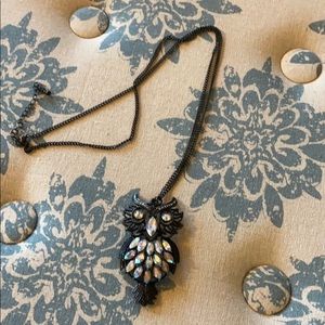 Cute black owl necklace with fun jewels.